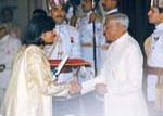 Kiran receiving her Padmashri Award from erstwhile President R Venkatraman